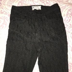 Free people black textured jeans.